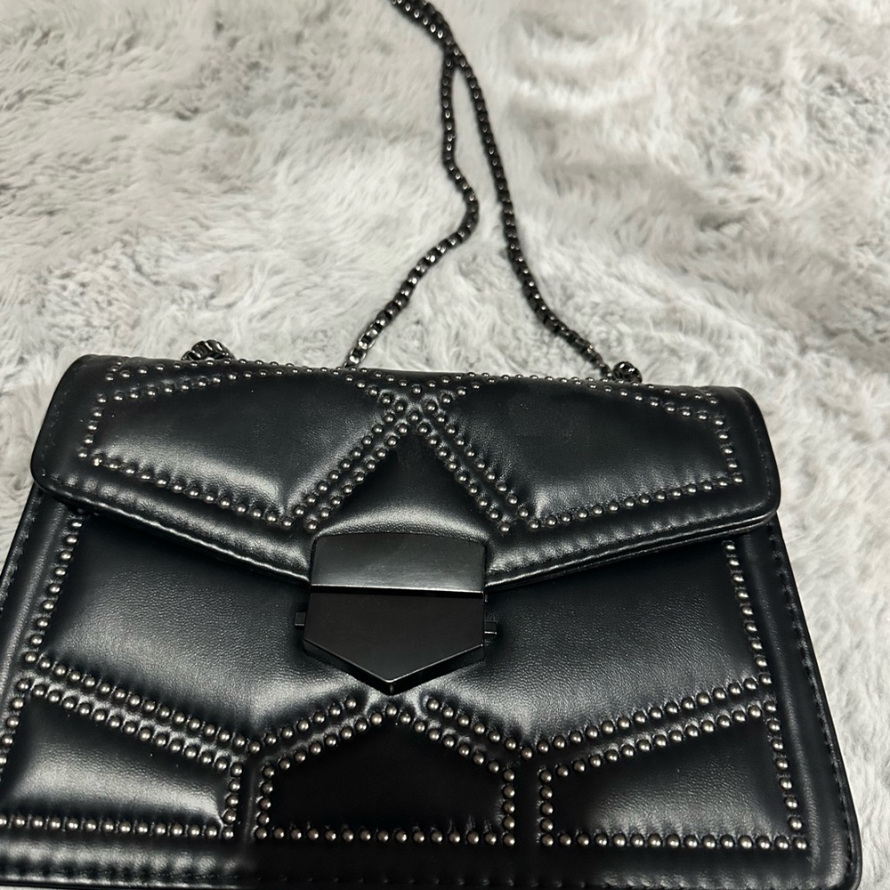 Black crossbody bag with black chain